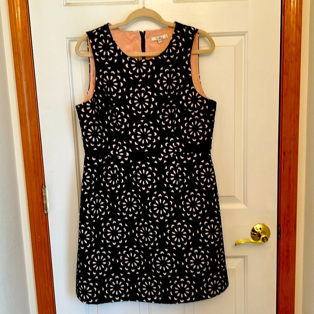 Cocktail dress, size 14, sleeveless, black jacquard cut-out, pink background.